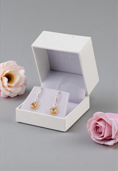 Aros Sofia Baño Oro Blanco Creado con Cristal Swarovski® Golden Shadow