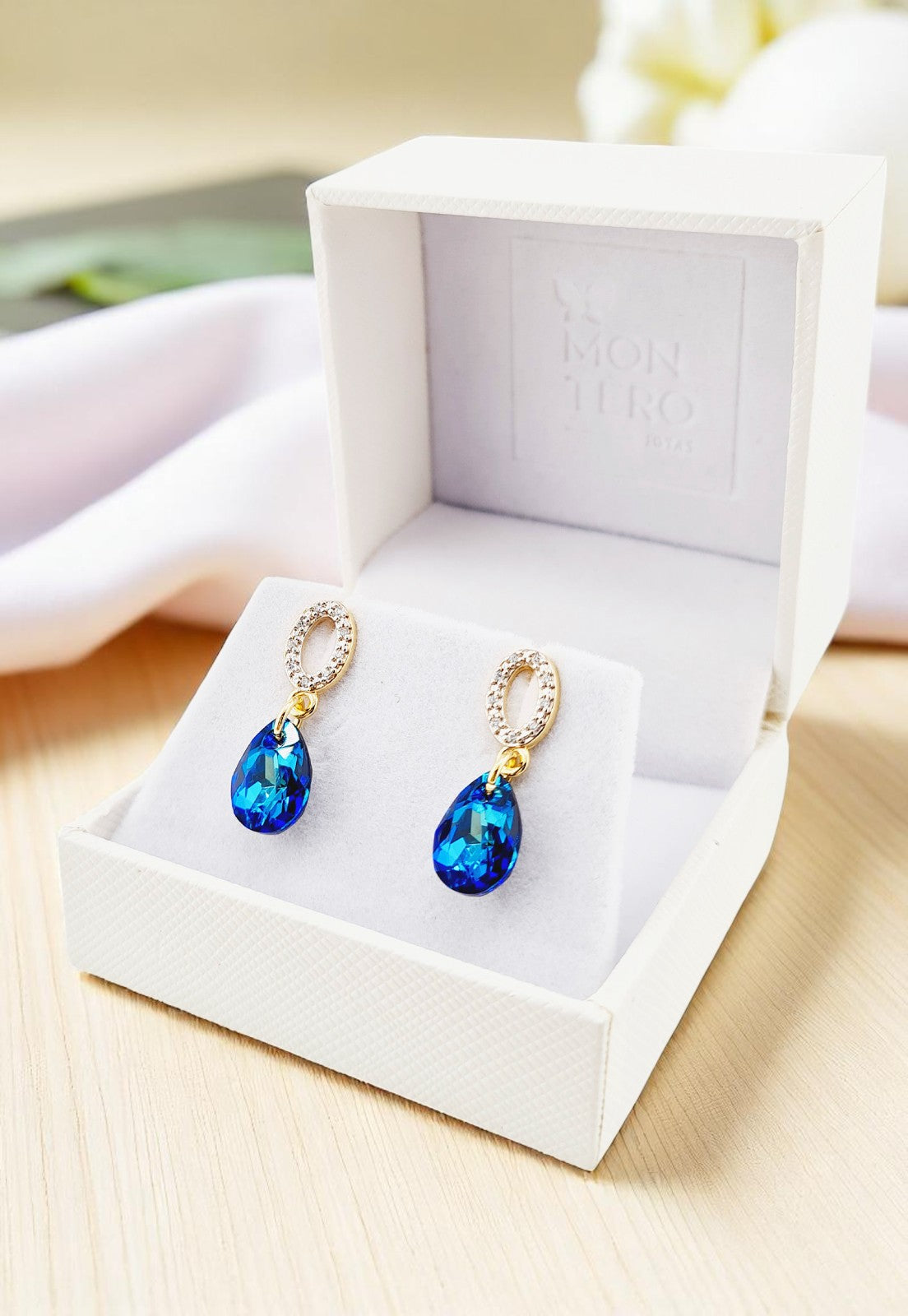 Aros Gota de Luz Gold 24k Cristal Genuino Bermuda Blue