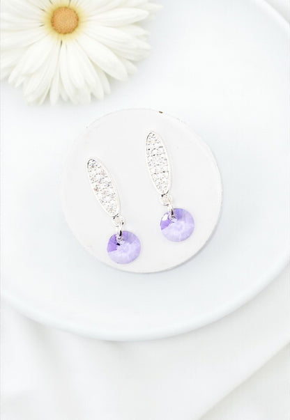 Aros Punto de Luz Baño de Oro Blanco Cristales Violeta